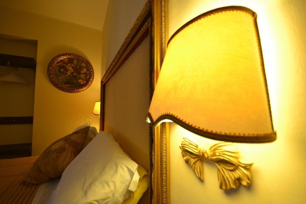 Case Brizi Asís Habitación foto