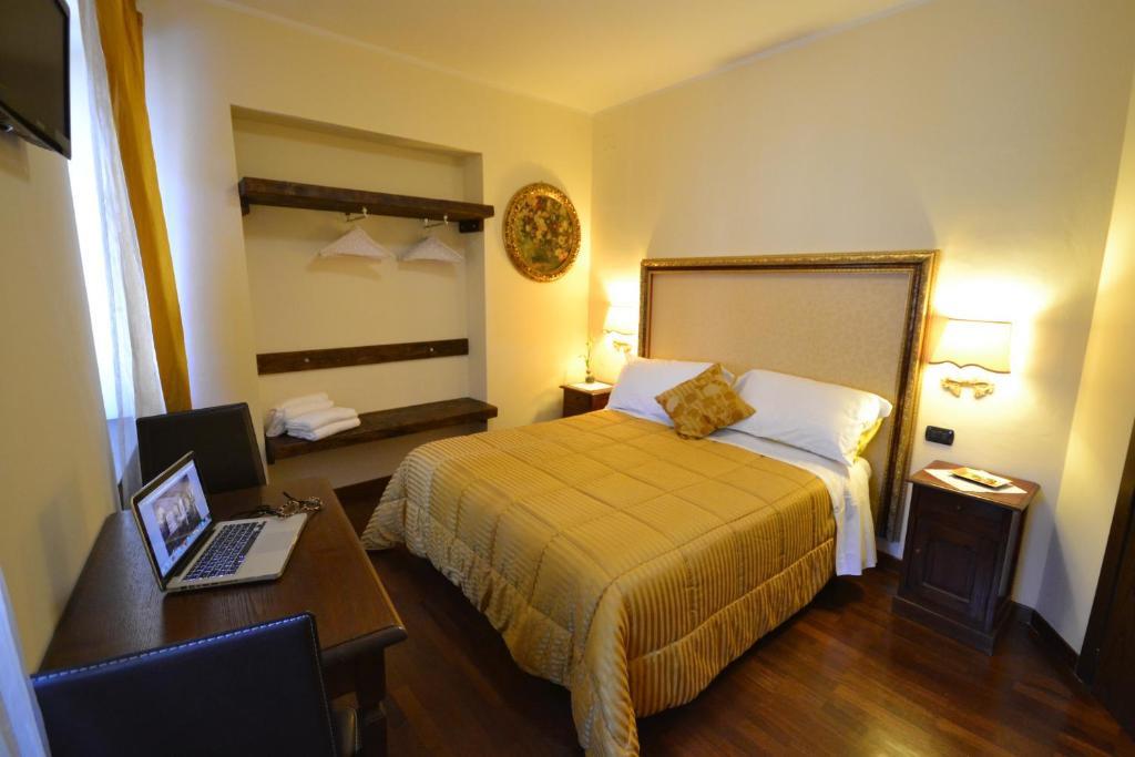 Case Brizi Asís Habitación foto